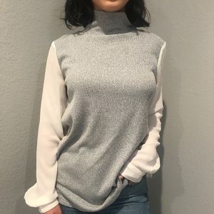Turtleneck sweater with attached blouse